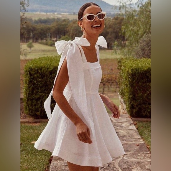 NWT - DISSH AISLE WHITE LINEN BOW MINI DRESS - US WOMEN’S SIZE: 12 - Picture 1 of 9